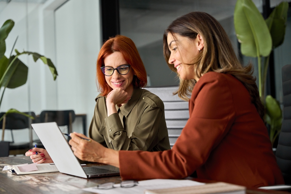 Women working on lead generation.